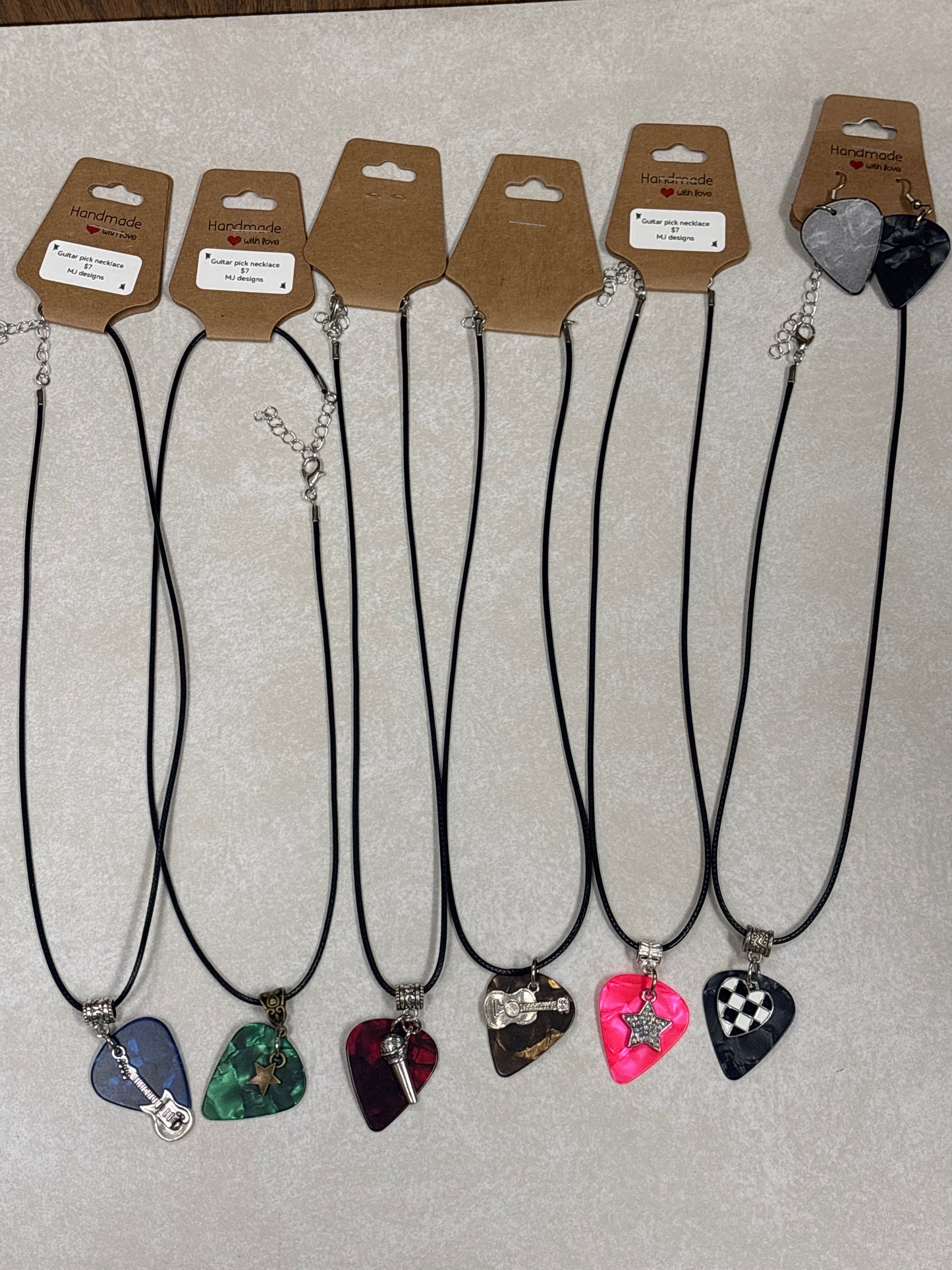 MJ guitar pick jewelry
