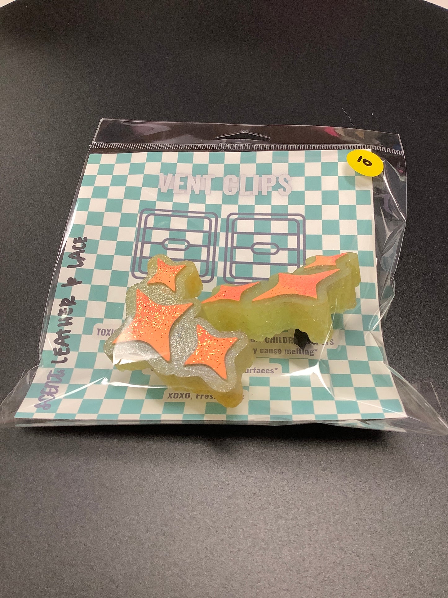 Leather and lace vent clip