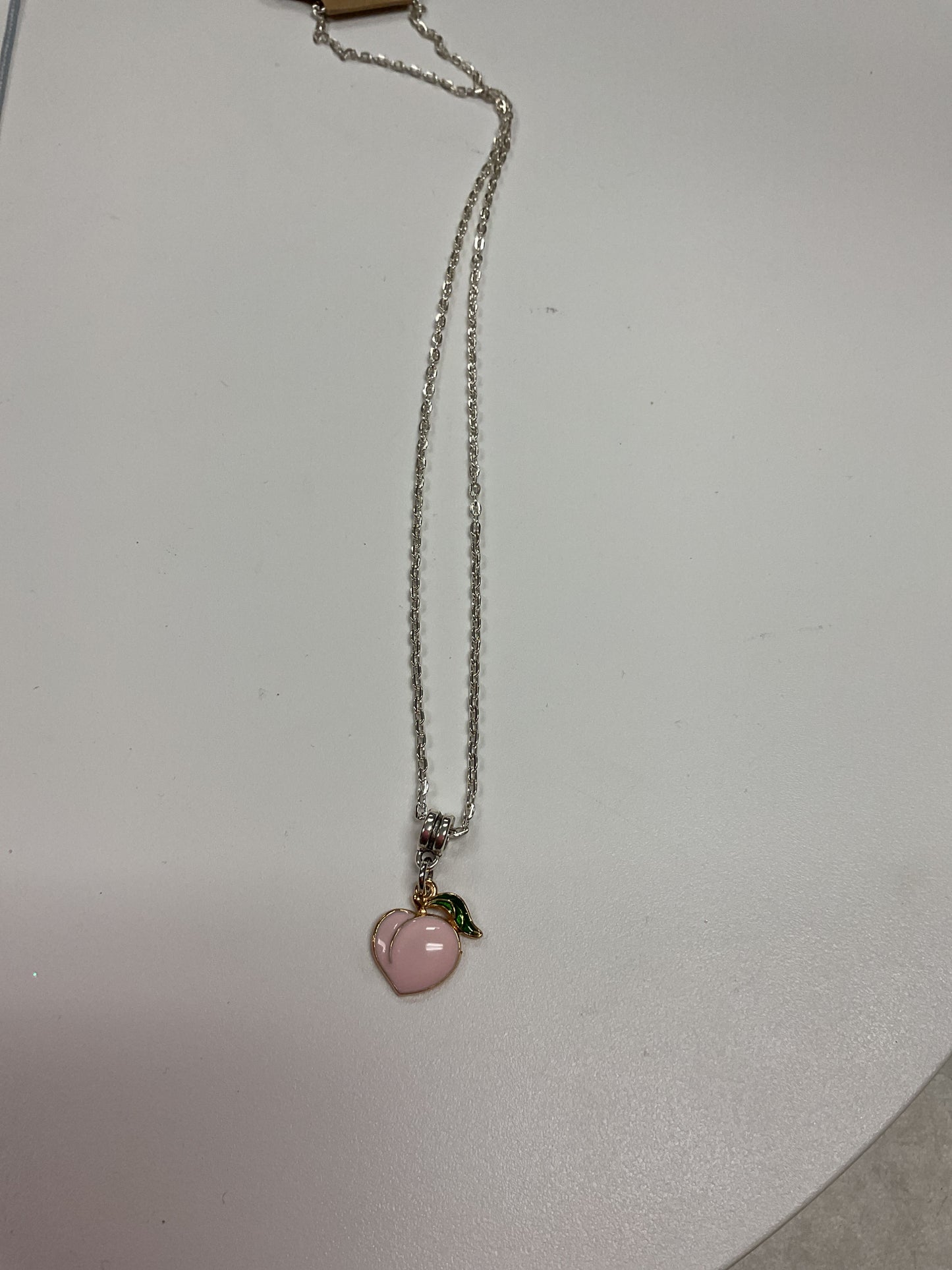 MJ peach charm necklace