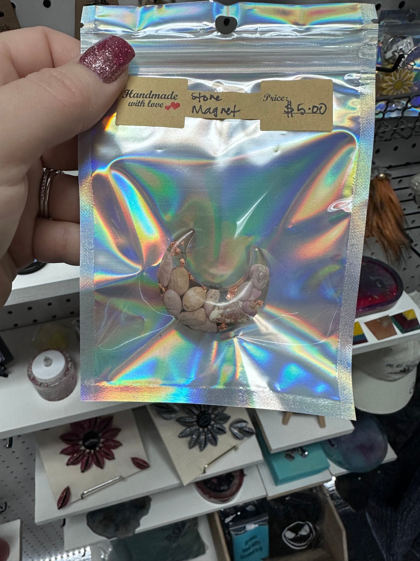 Crescent moon magnet with purple stones