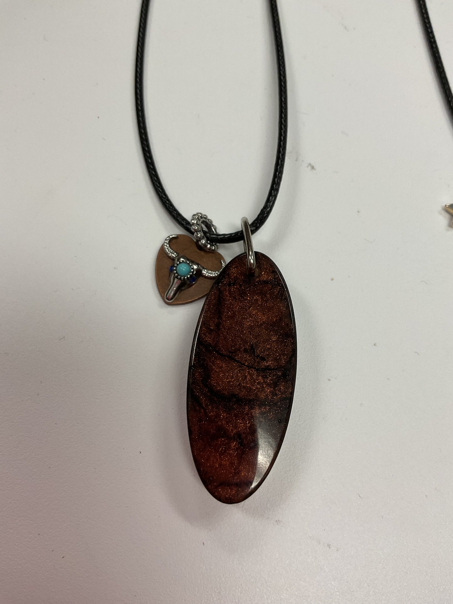 MJ resin and pendant necklaces