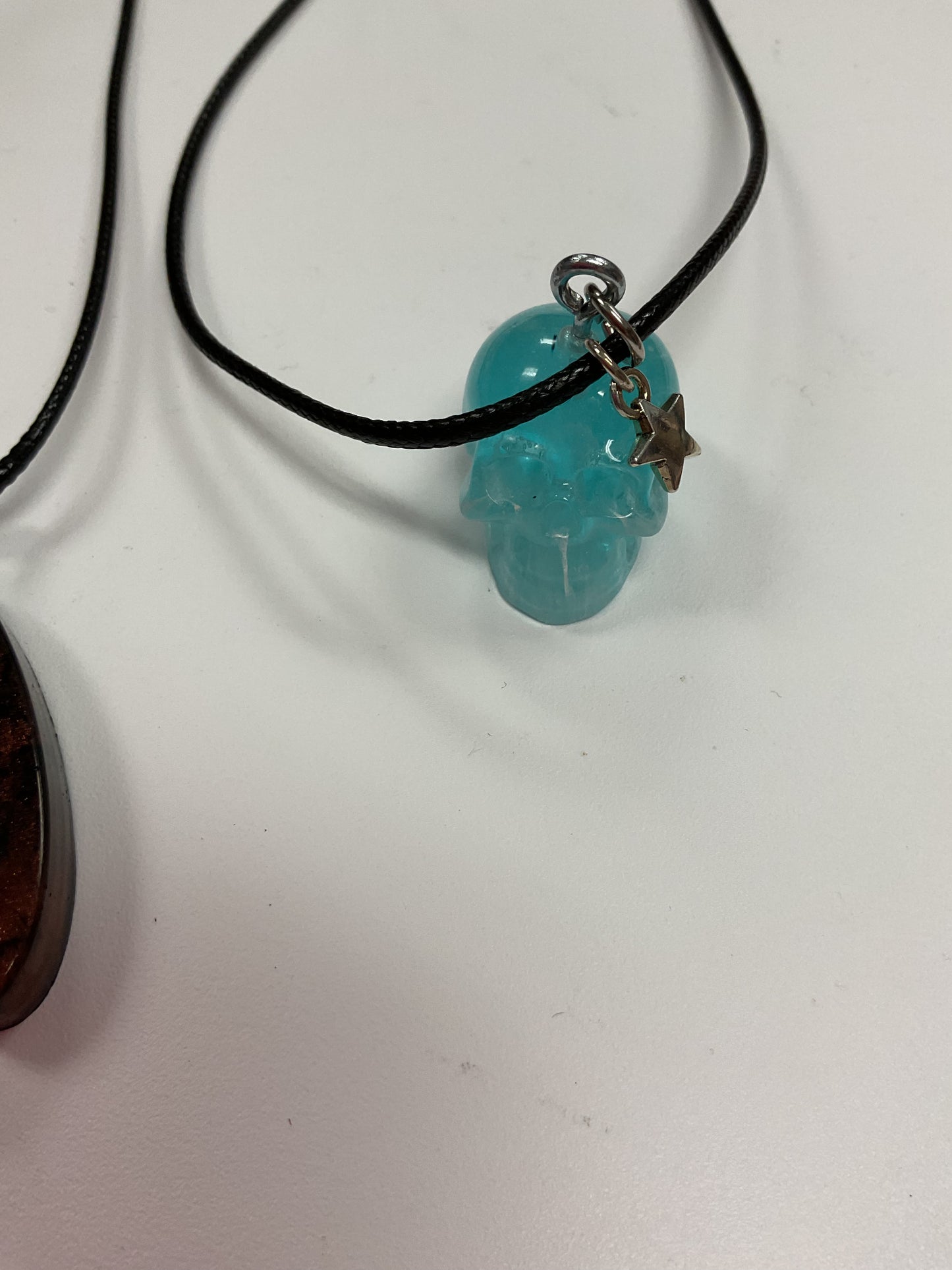 MJ resin and pendant necklaces