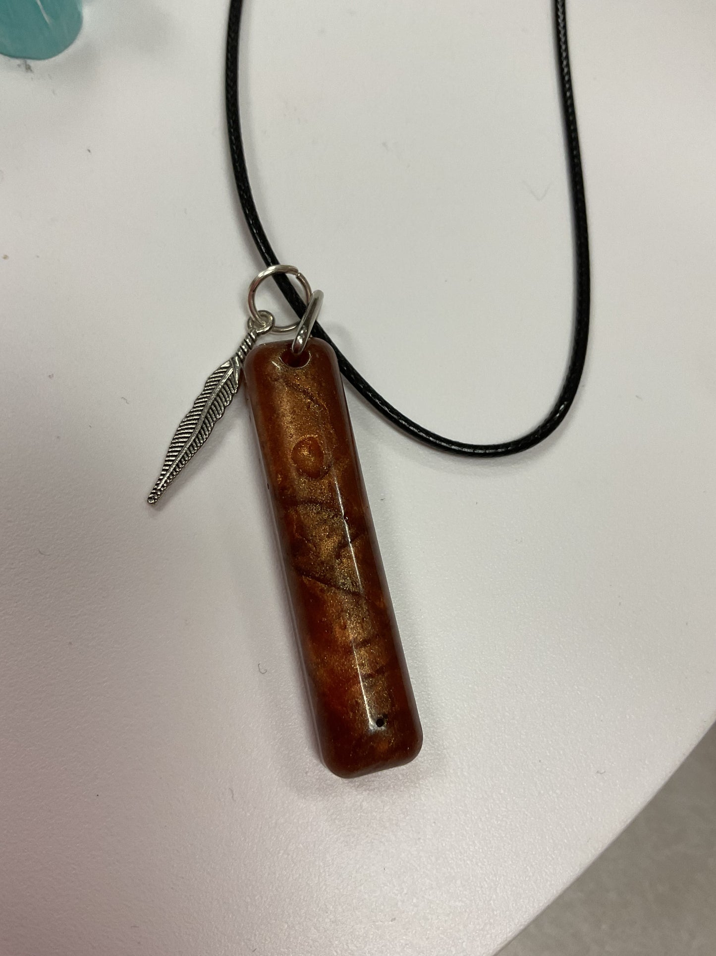 MJ resin and pendant necklaces