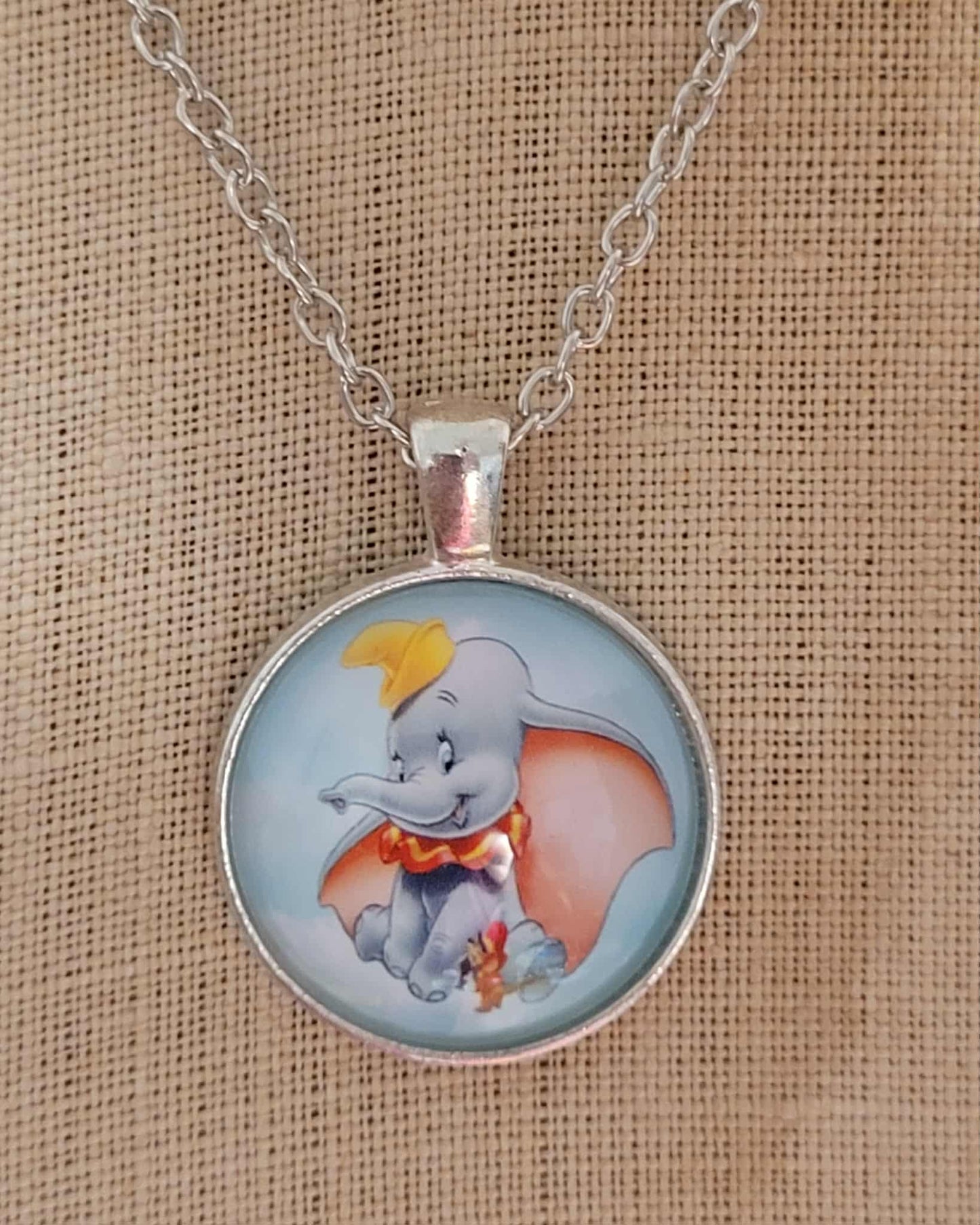 Dumbo glass cabochon necklace