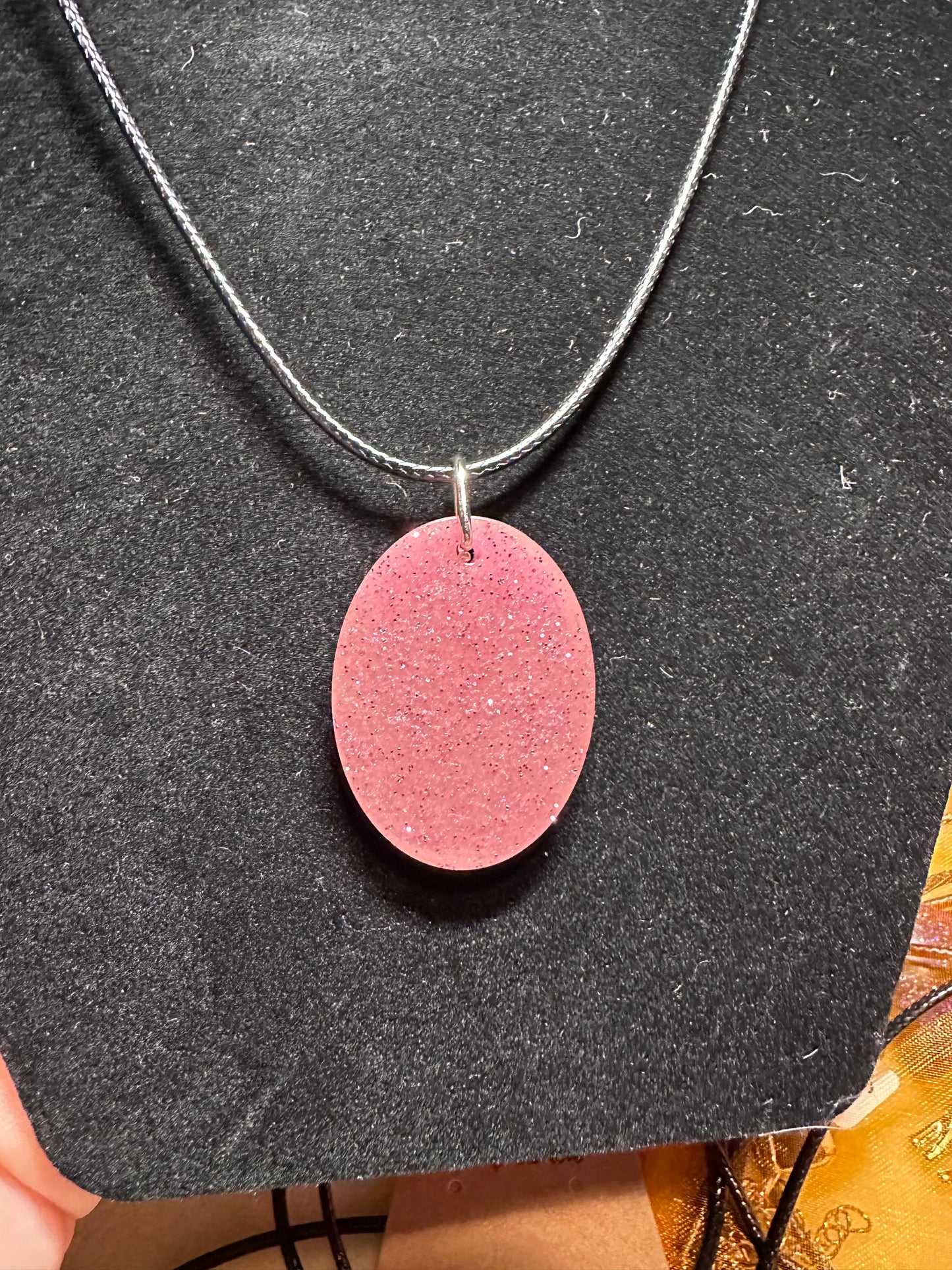 Pink glitter oval pendant