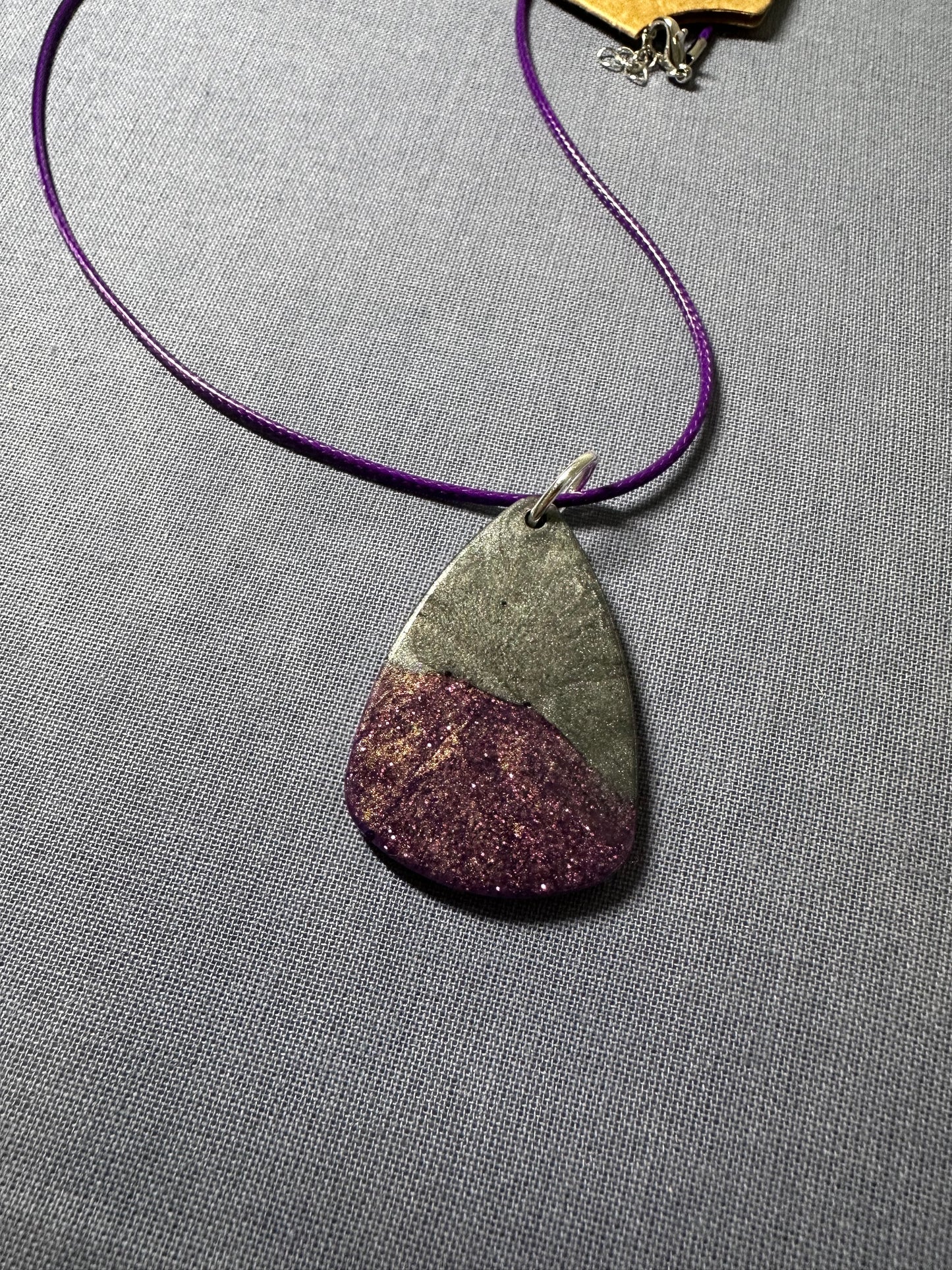 Purple and silver resin pendant