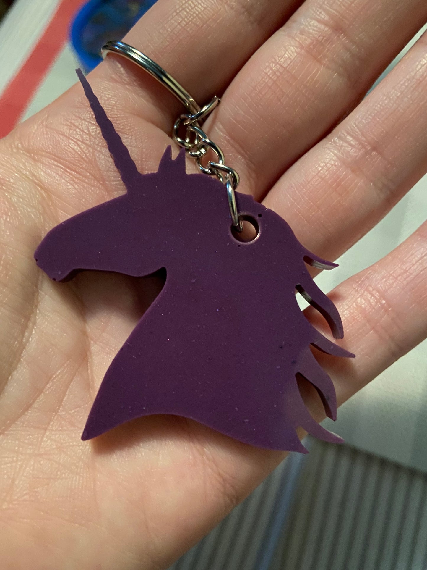 Purple resin unicorn keychain