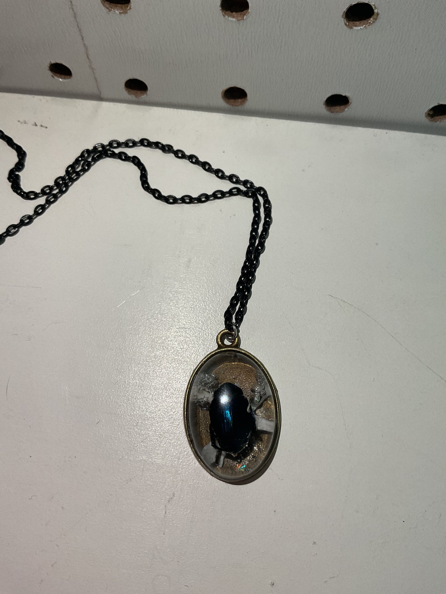 Butterfly and beetle necklaces