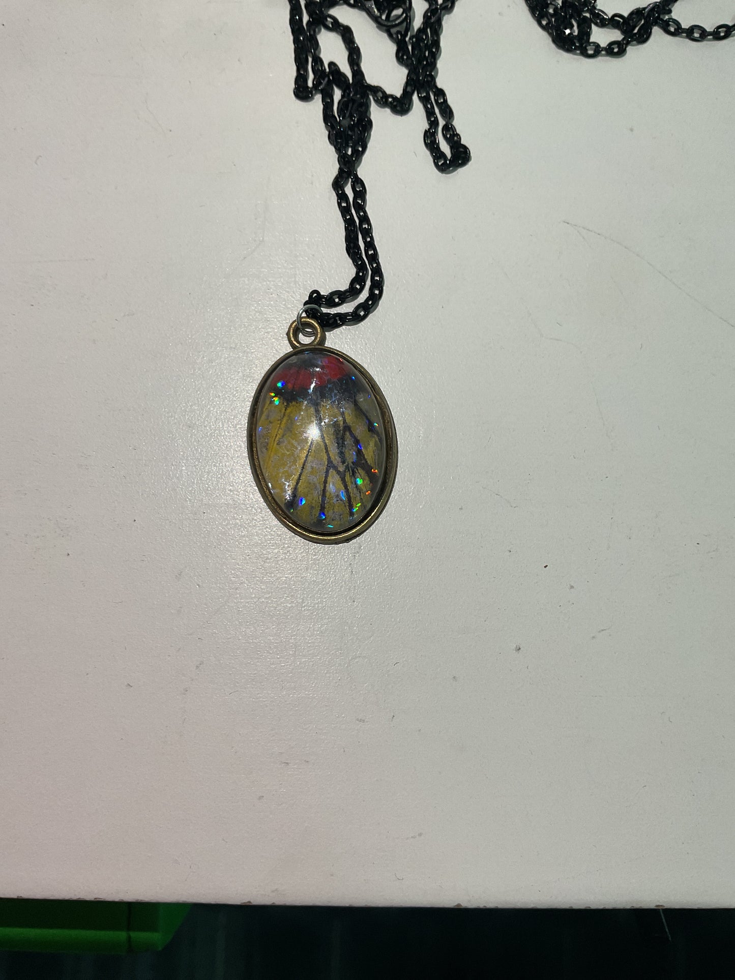 Butterfly and beetle necklaces
