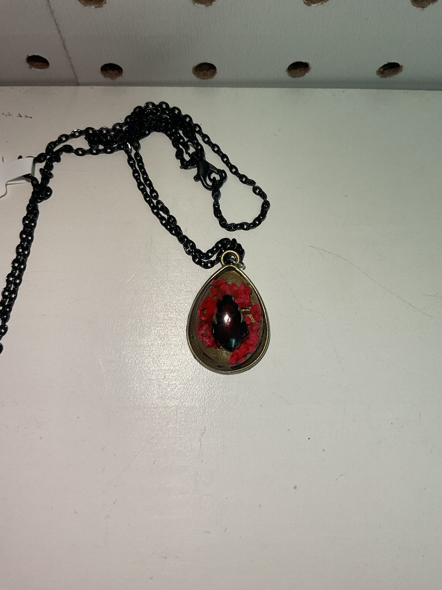 Butterfly and beetle necklaces