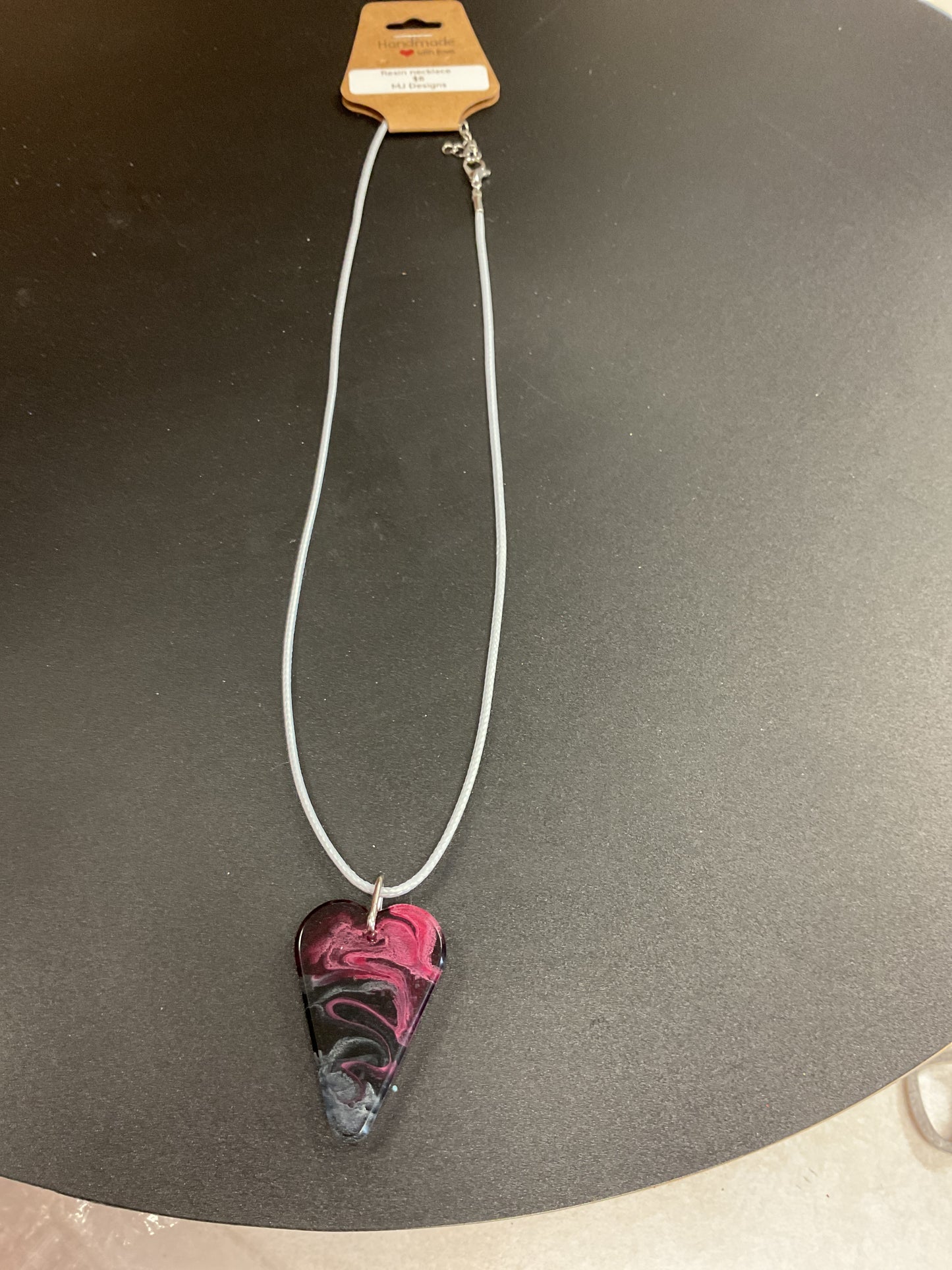 MJ resin and pendant necklaces