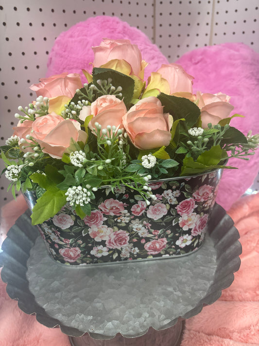 Floral bouquet in tin