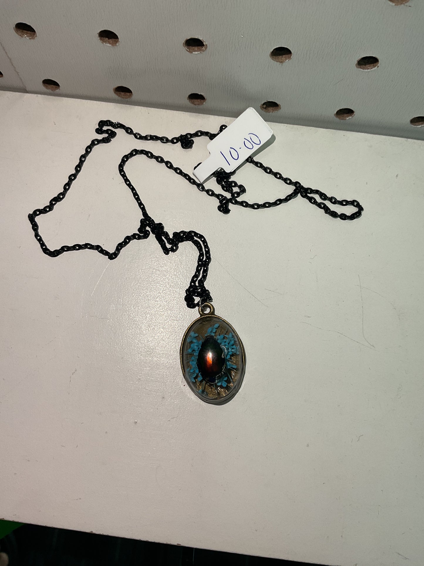 Butterfly and beetle necklaces