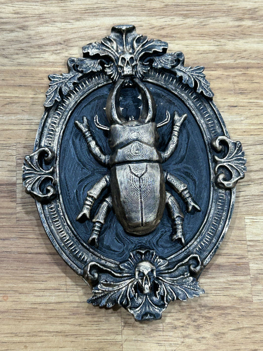 Beetle in Baroque frame