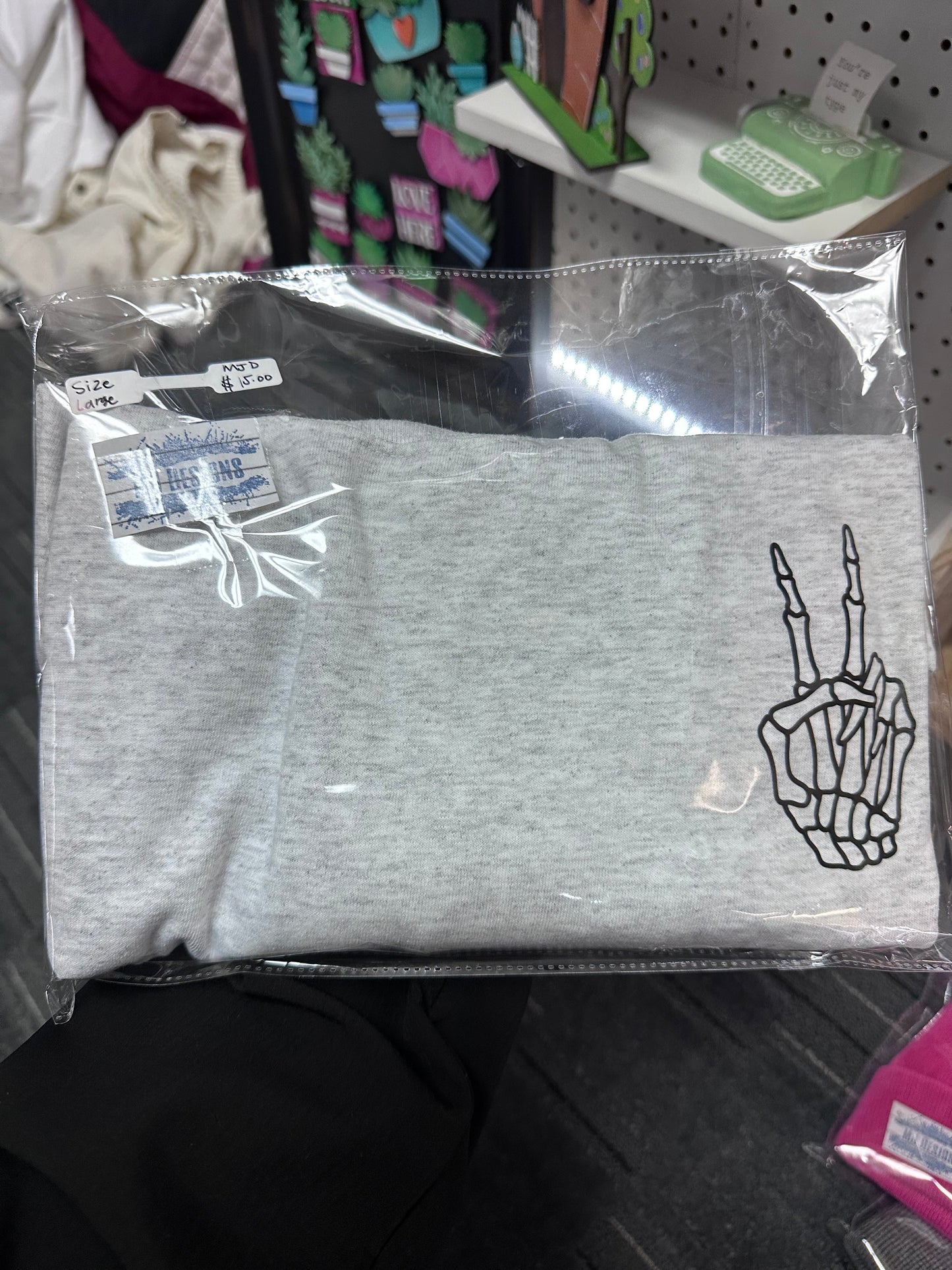 Grey T-shirt with black skelly hand