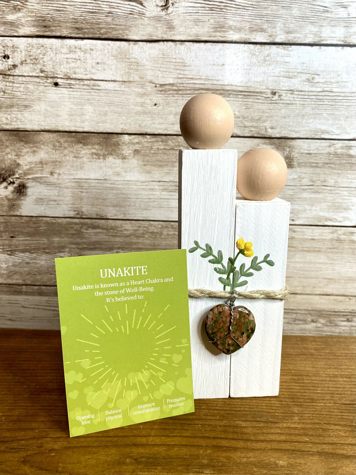 Wood couple with crystal heart