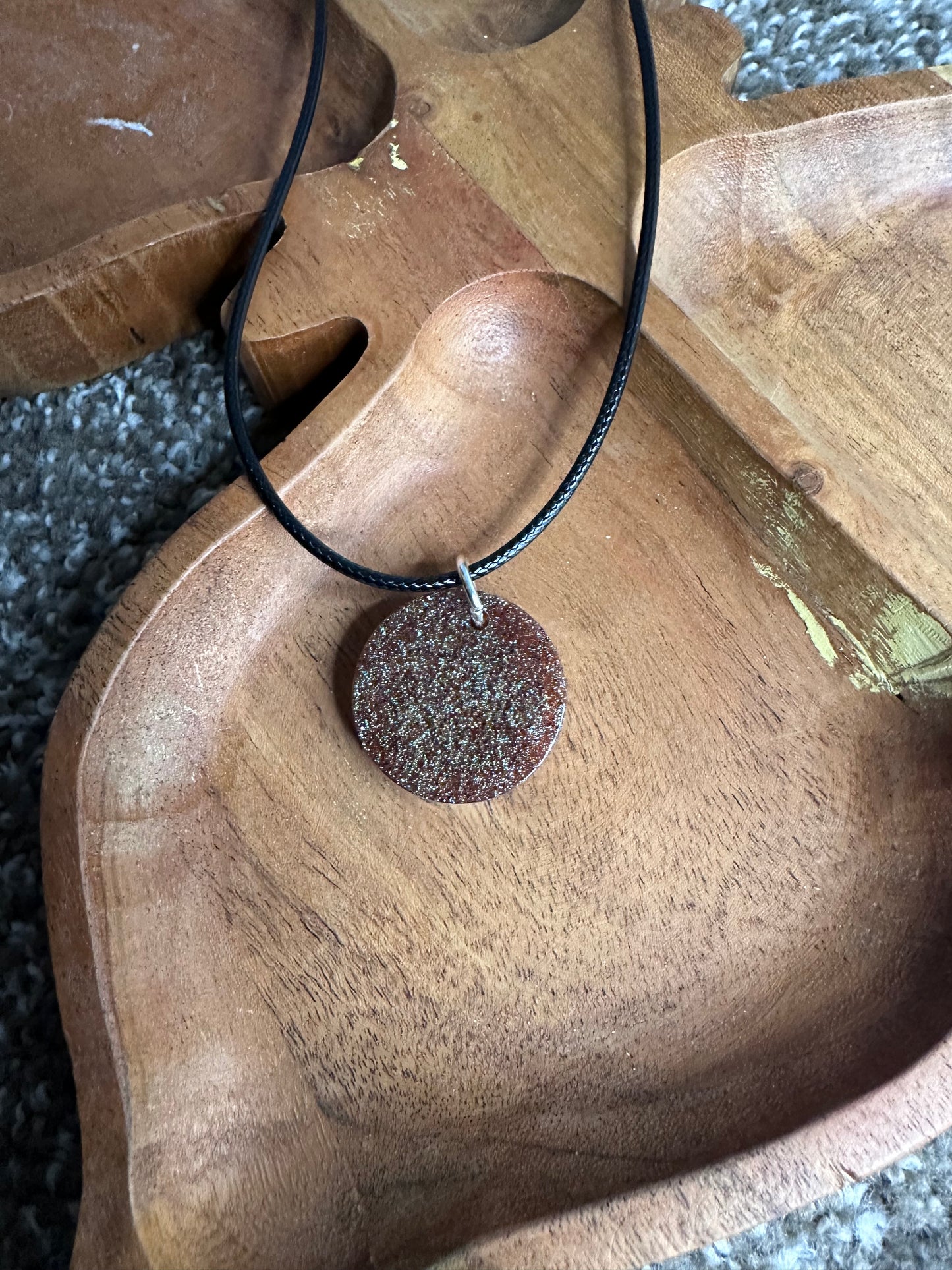 Medium circle resin pendant bronze and black glitter