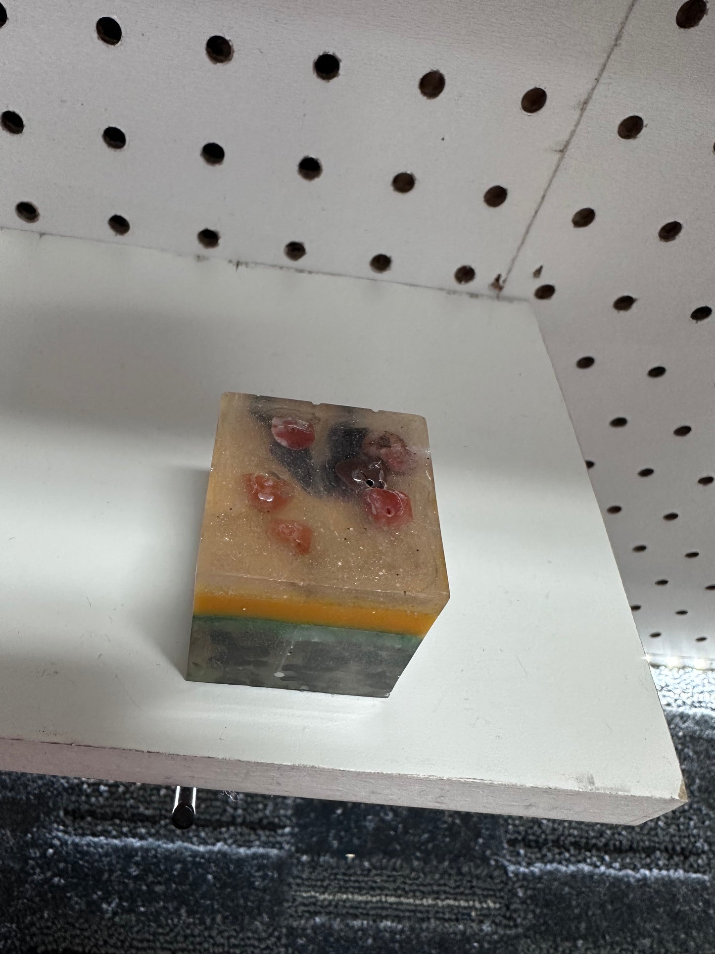 Multi colored resin cube with stones