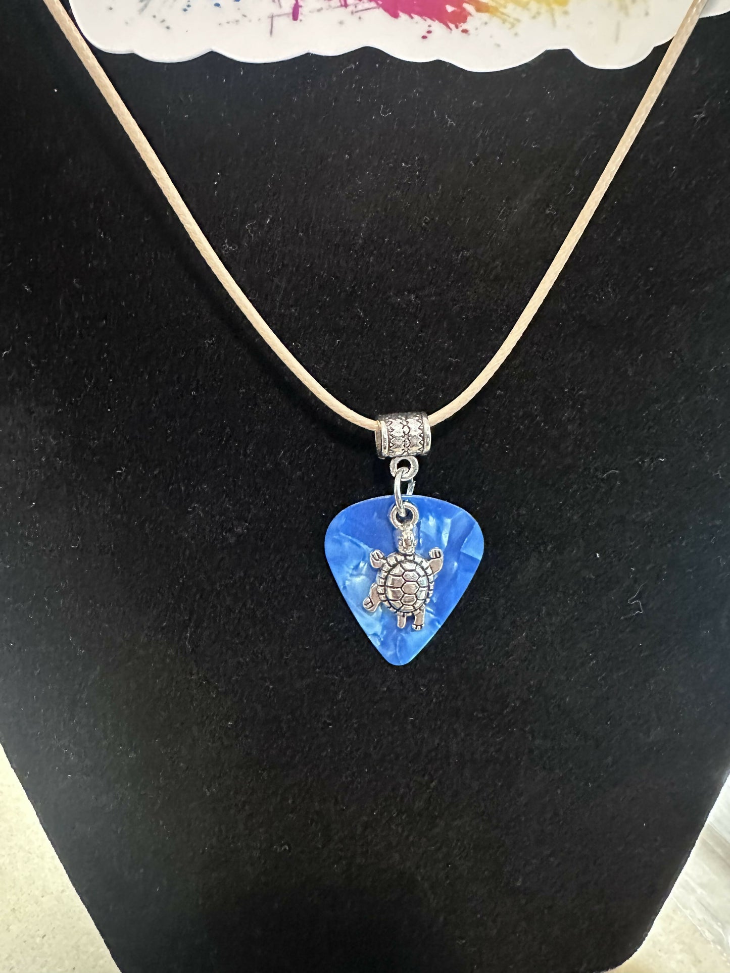 MJ guitar pick jewelry