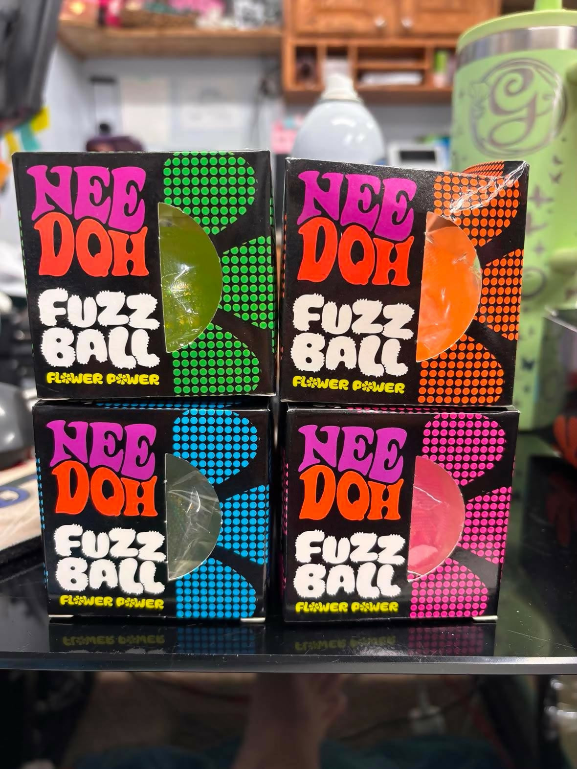 Glow in the Dark smiley face fuzz ball