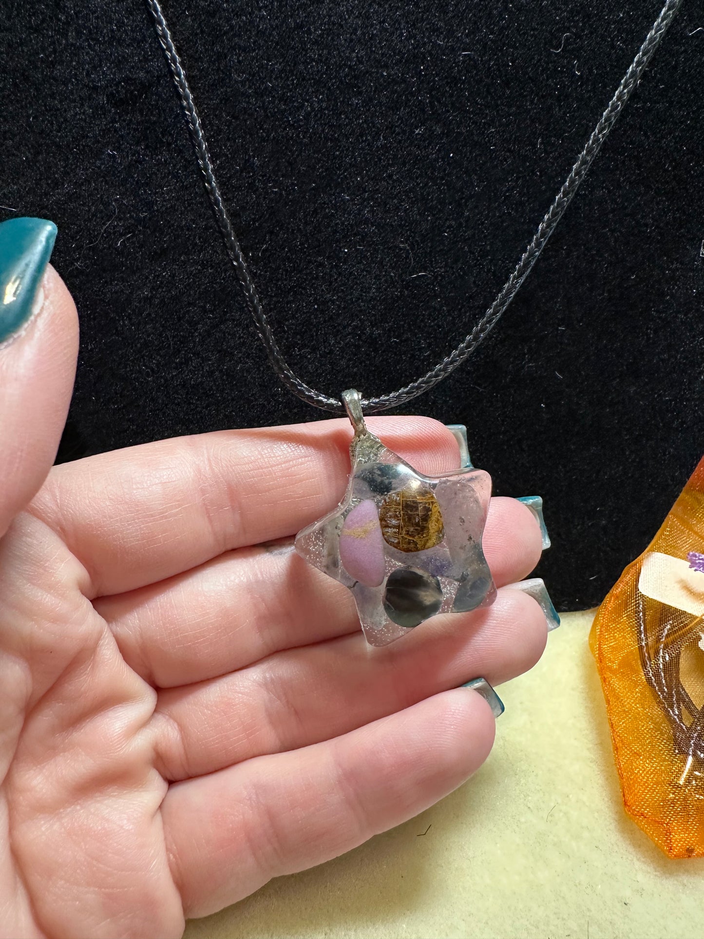Star pendant with stone chips