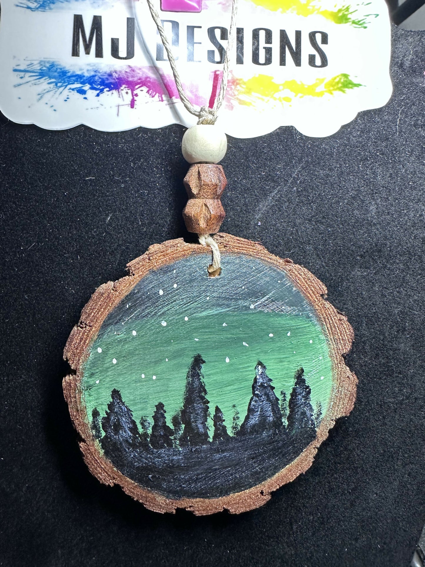 MJ wood slice paintings