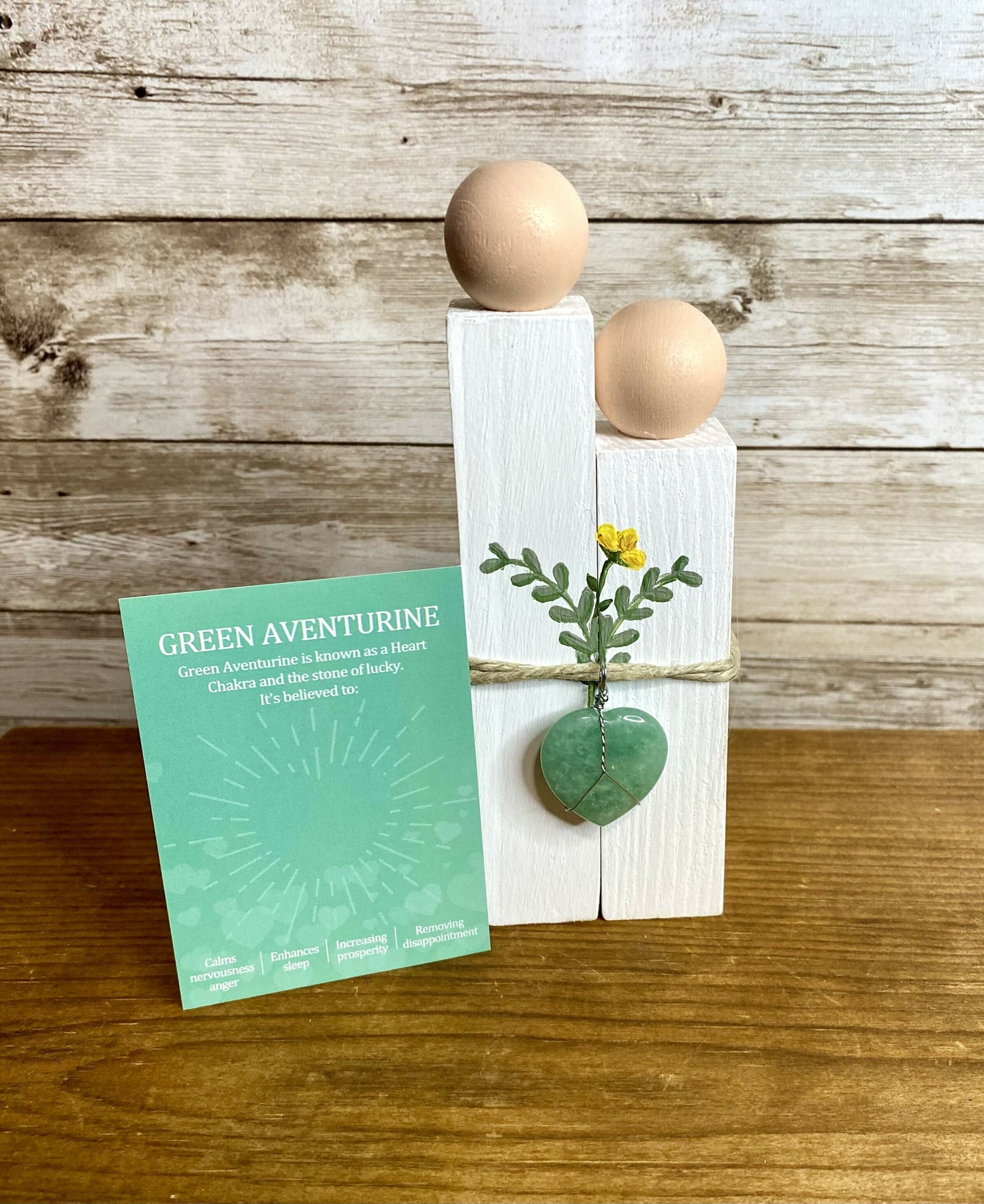 Wood couple with crystal heart