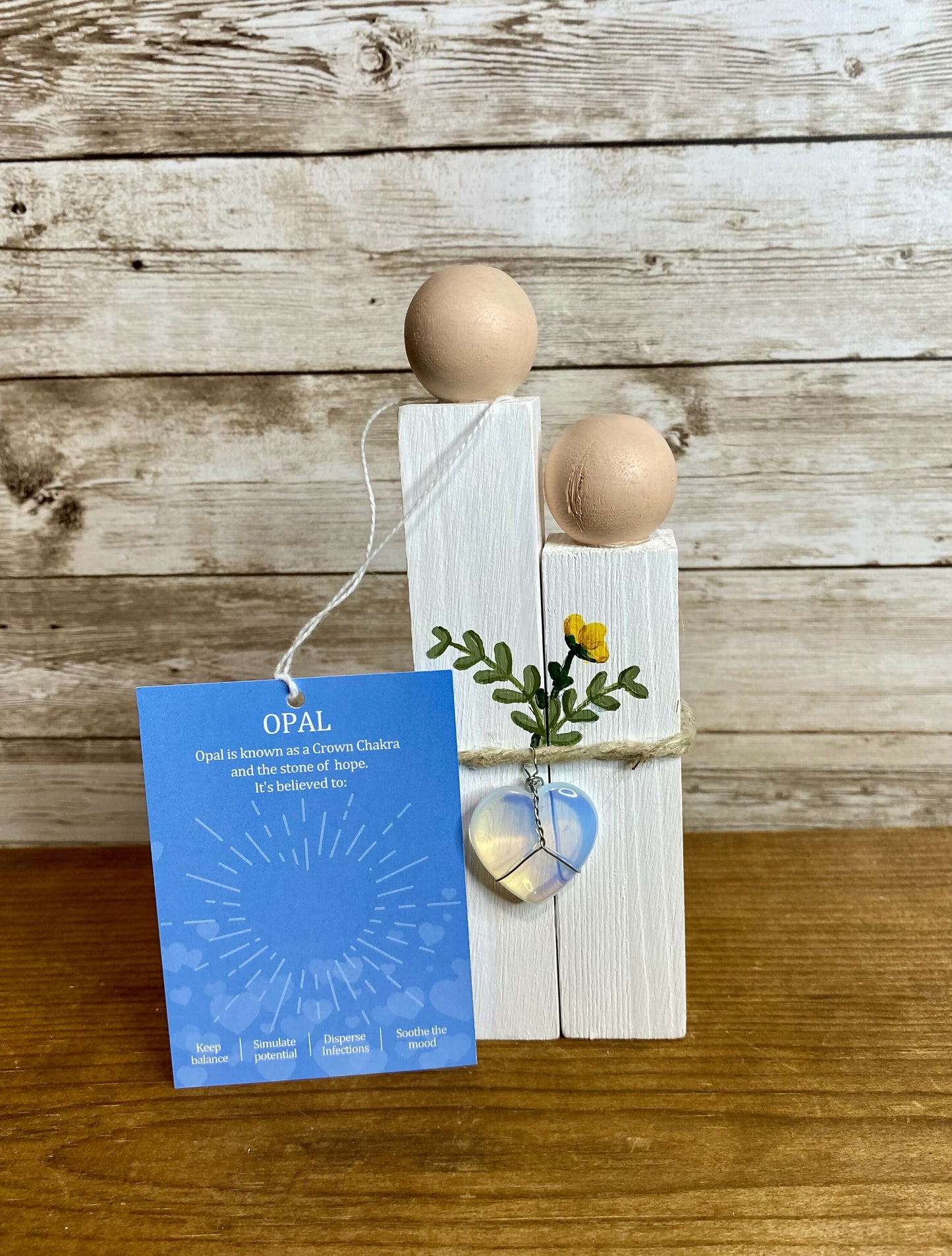 Wood couple with crystal heart