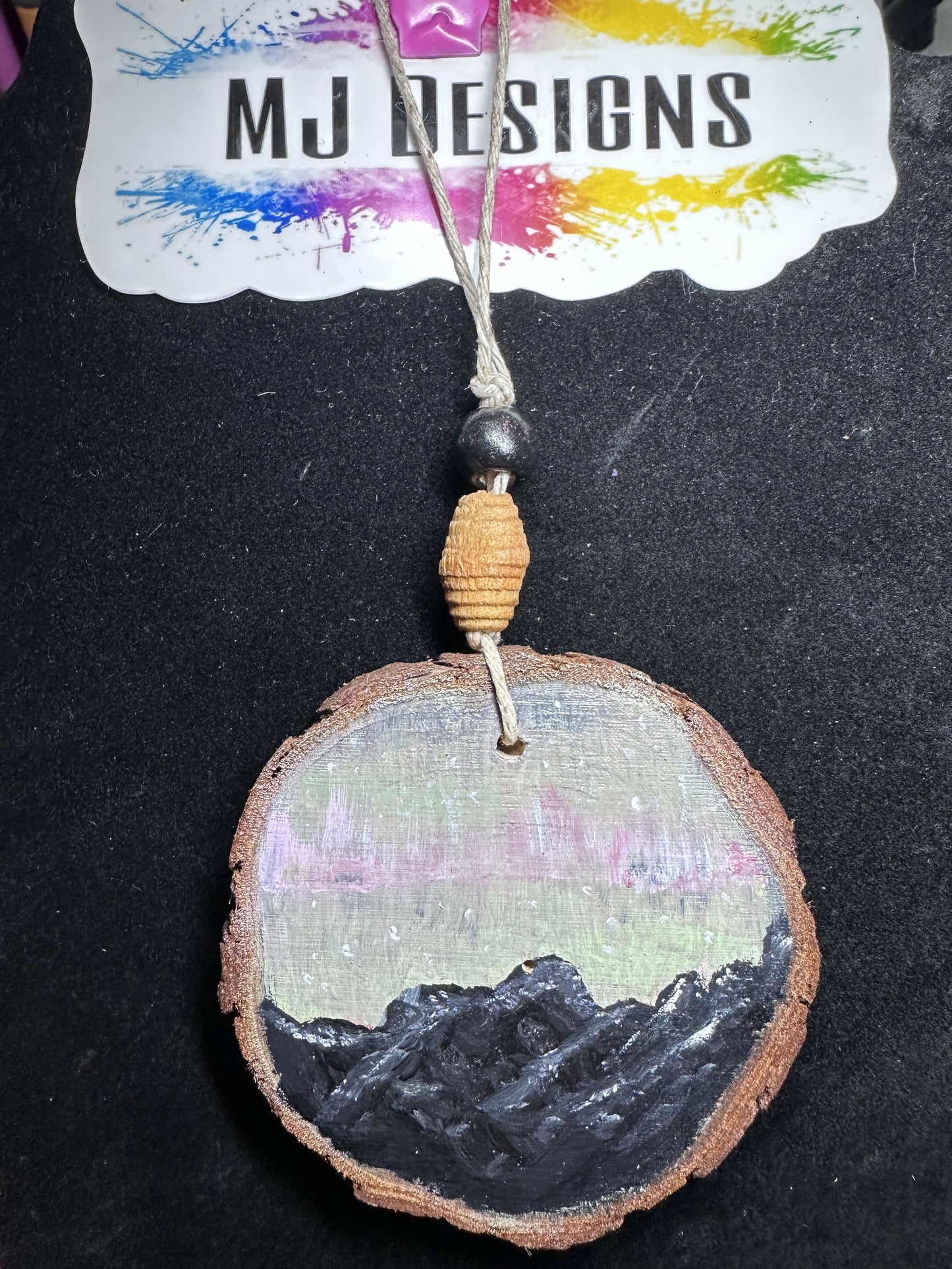 MJ wood slice paintings
